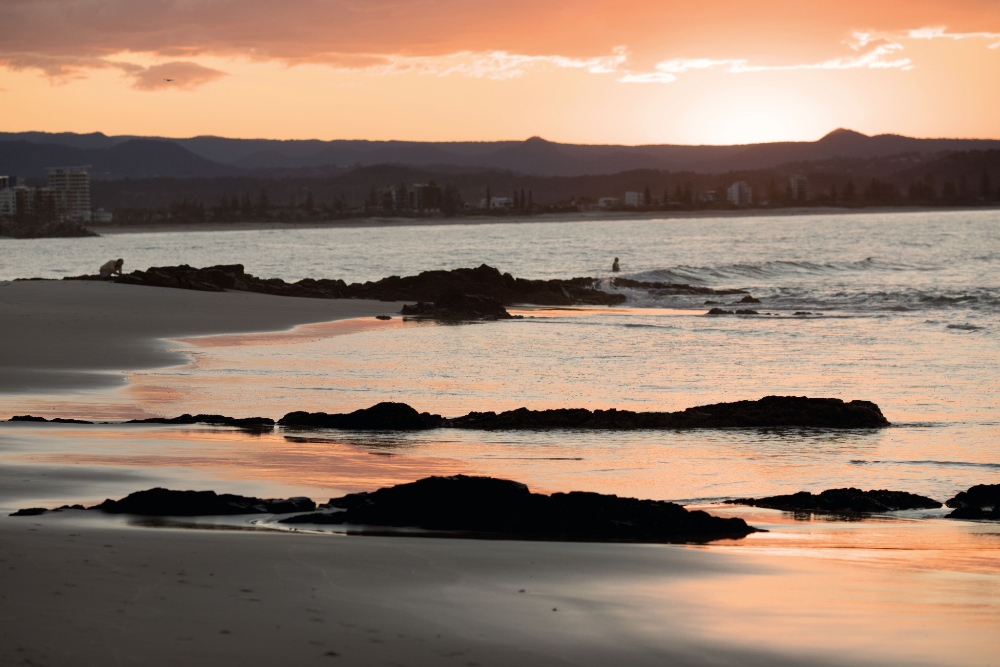 Coolangatta sunset over rocks