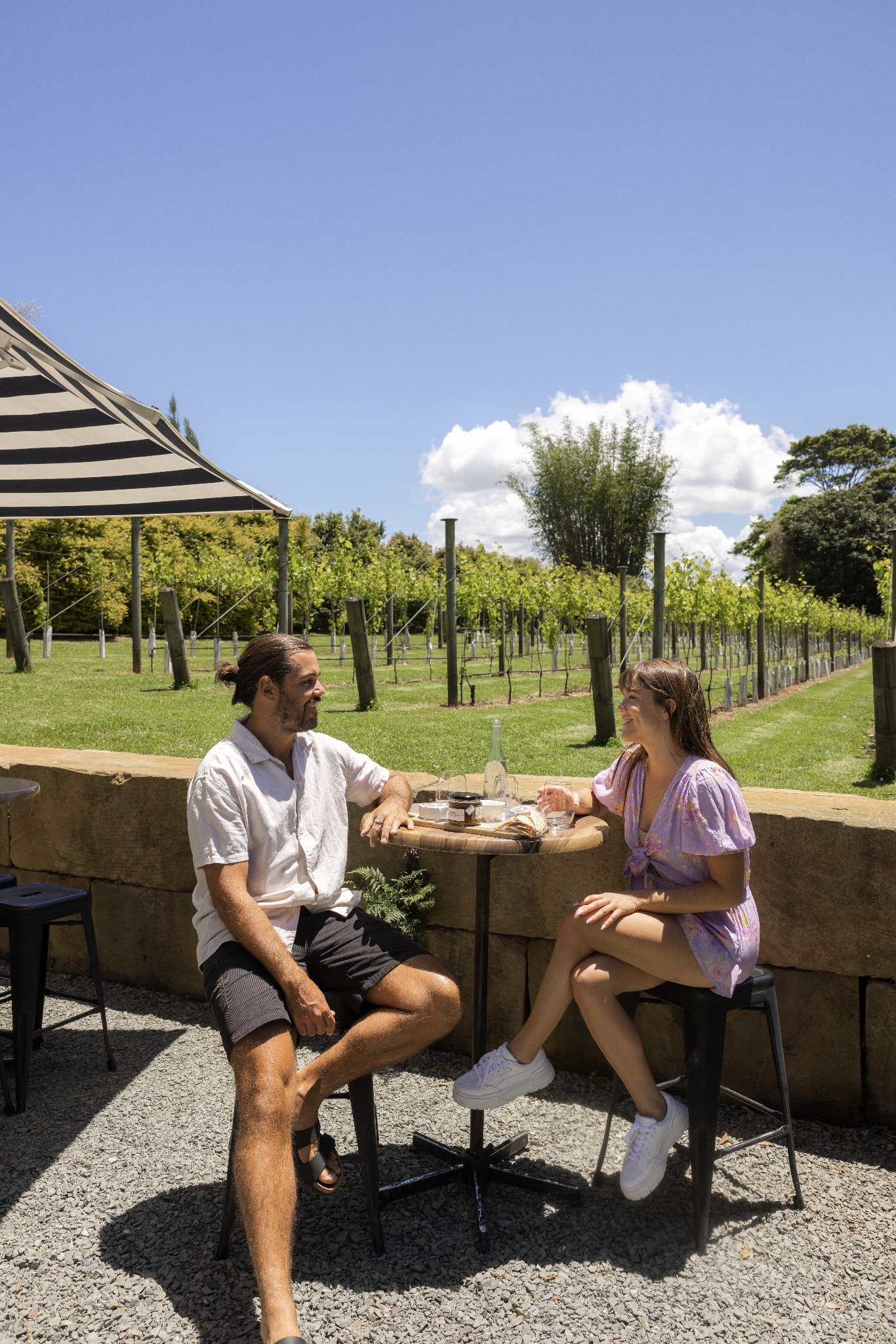 Couple enjoying a winery tasting on a Tamborine Mountain private tour